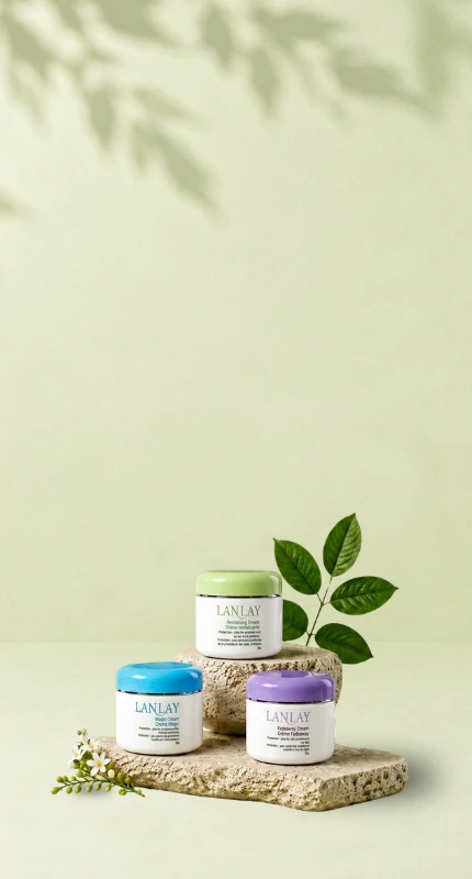 Lanlay Revitalizing, Magic, and Fadeaway creams on a stone plinth